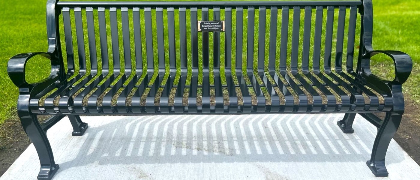 metal bench on concrete pad