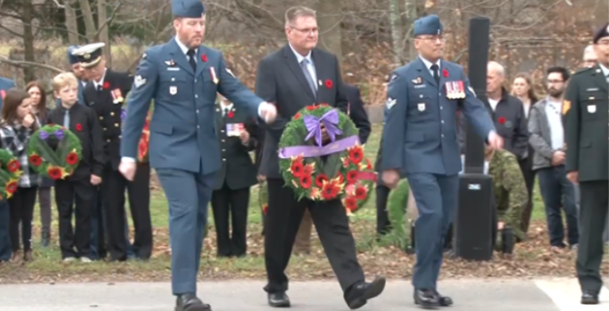 mayor laying a wreath at remembrance day service